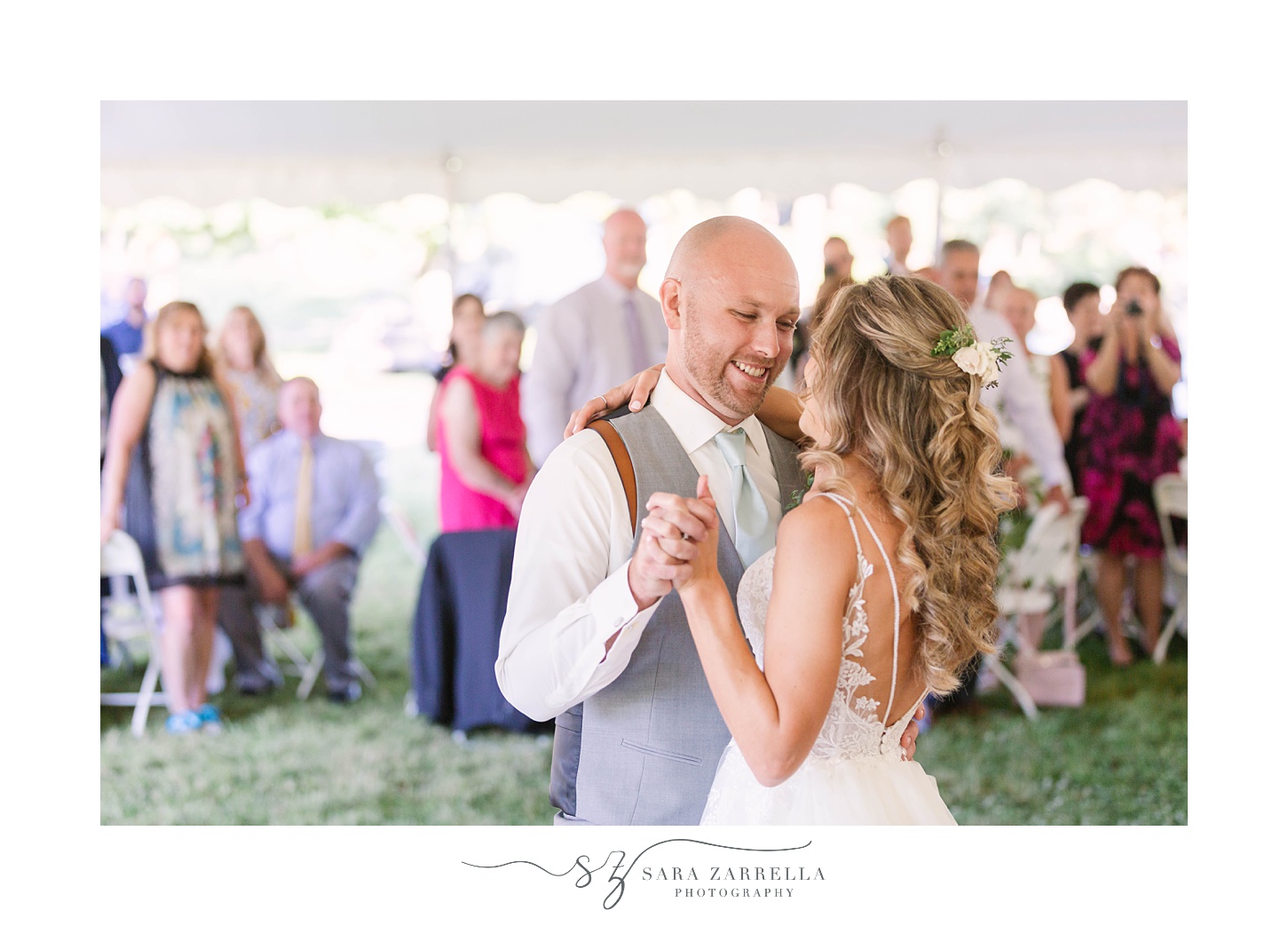 bride and groom dance during farm wedding reception