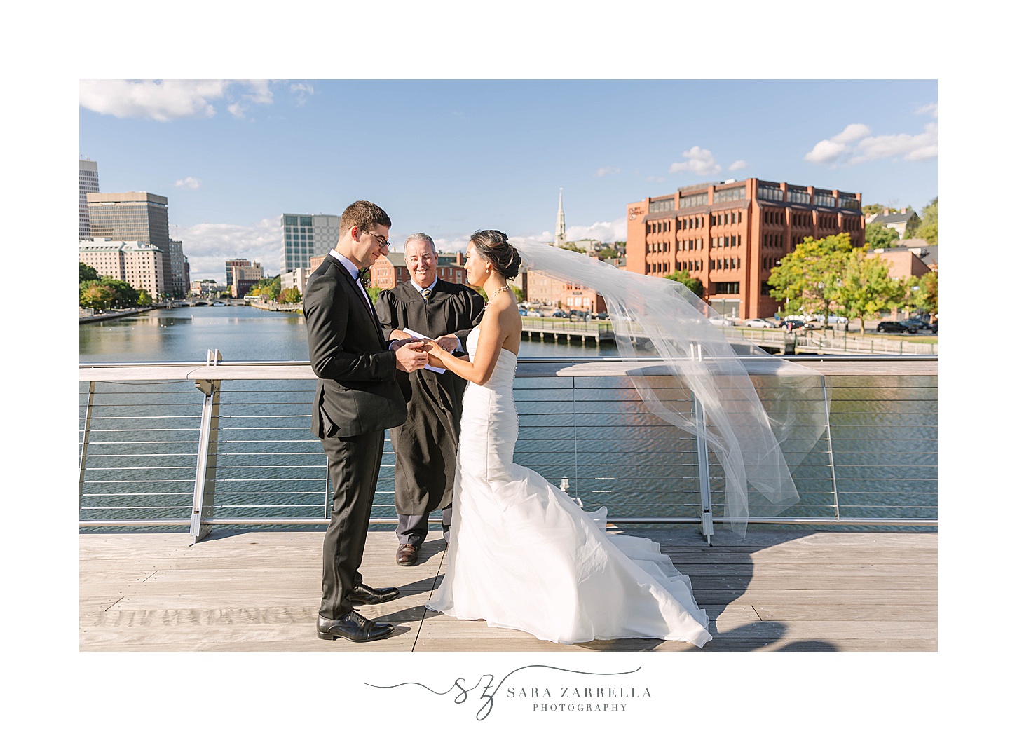 bride and groom exchange vows on bridge in Providence RI