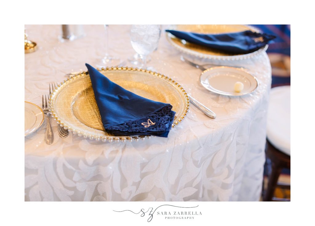 place settings with navy and gold details at Newport Navy Officers’ Club wedding reception 