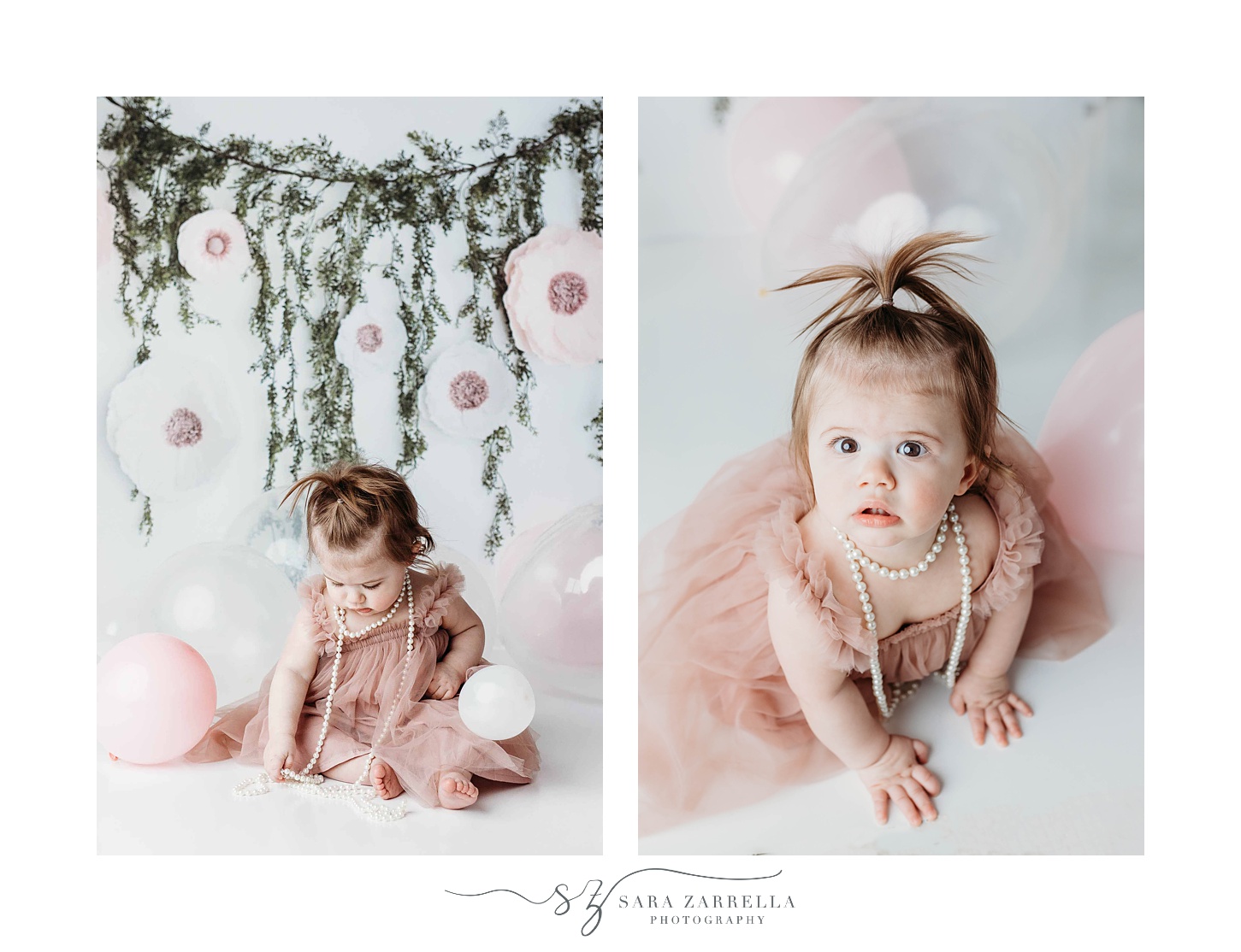 baby poses in front of pink balloons during Pastel Pink and White Cake Smash