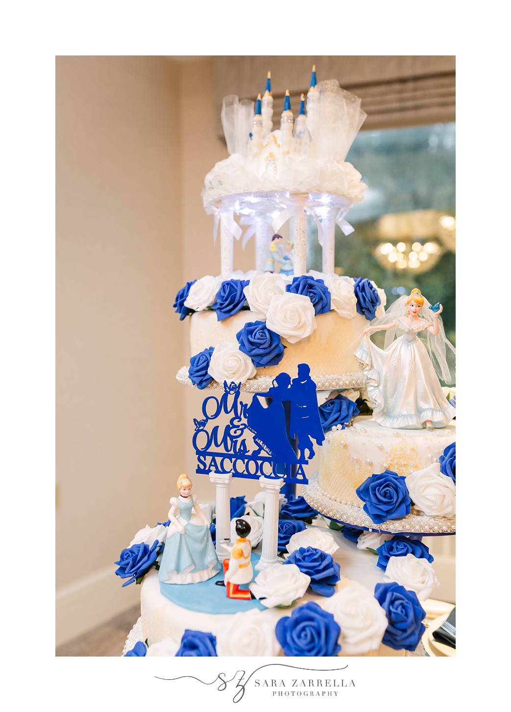 tiered wedding cake with blue and white icing