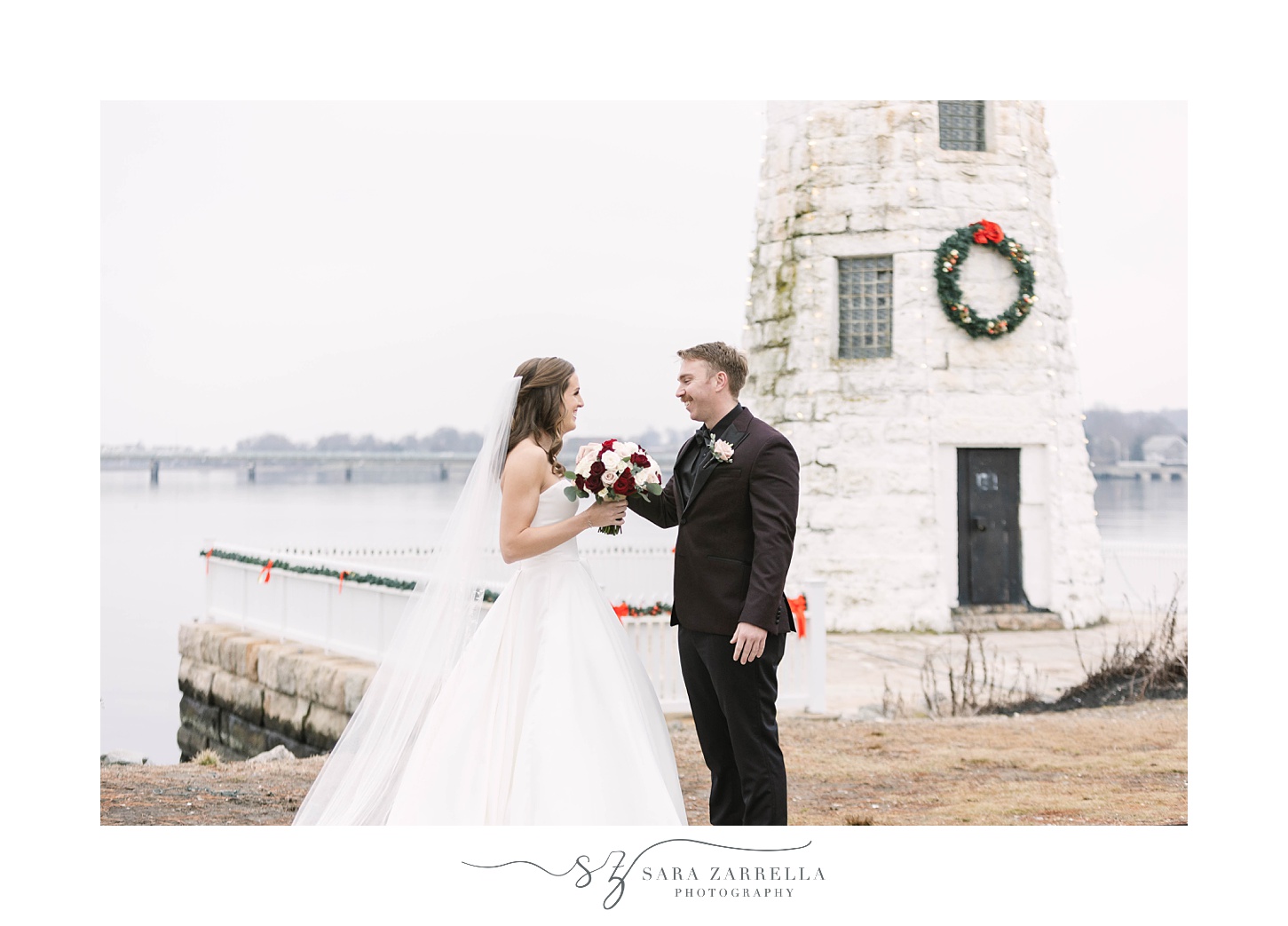 couple has first look by lighthouse at Belle Mer