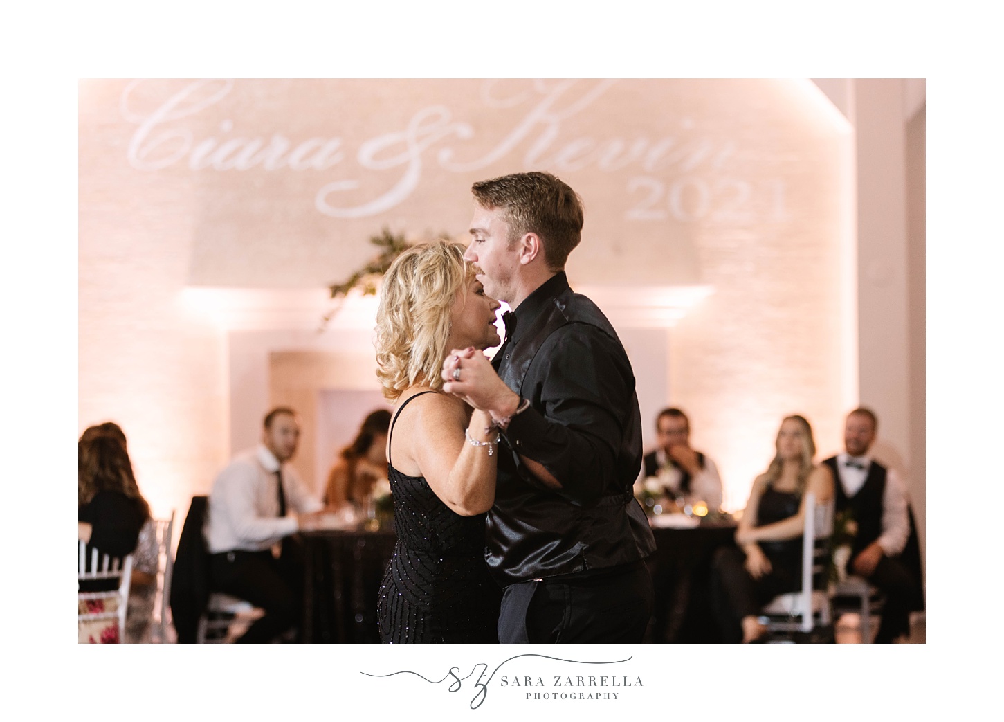 groom kisses mom's forehead during RI wedding reception dance