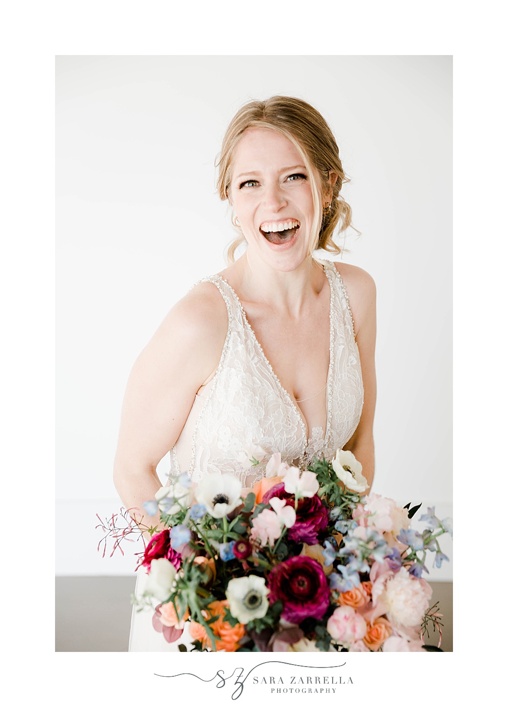 bride laughs during Newport Beach House wedding photos