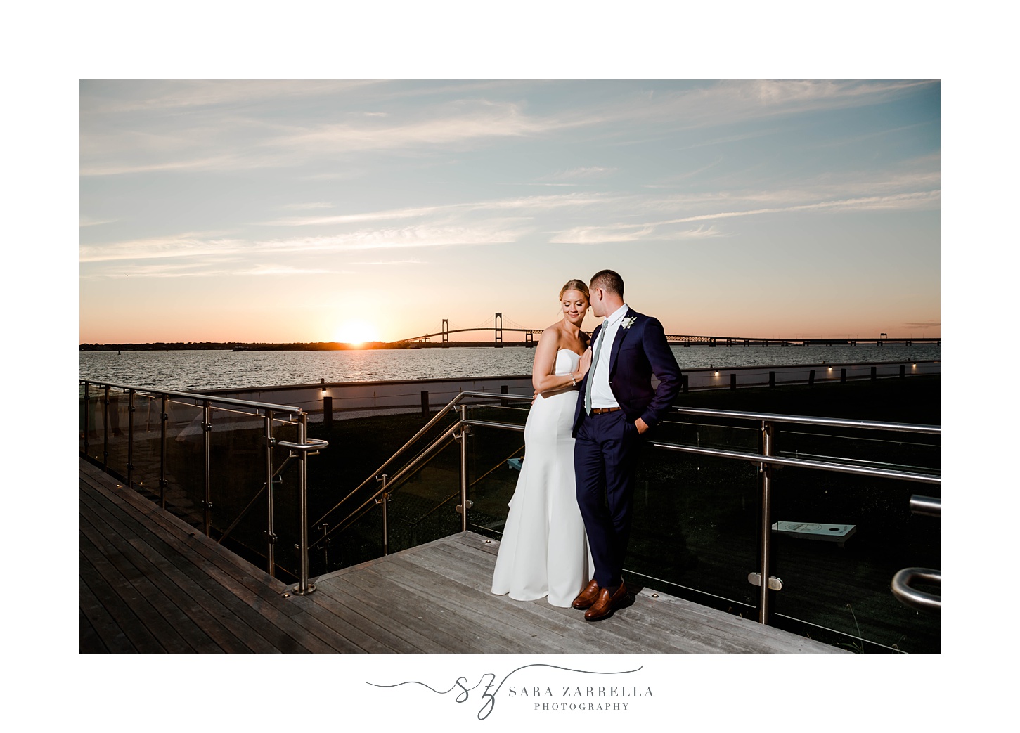 sunset portrait of bride and groom on deck at Gurney's Resort