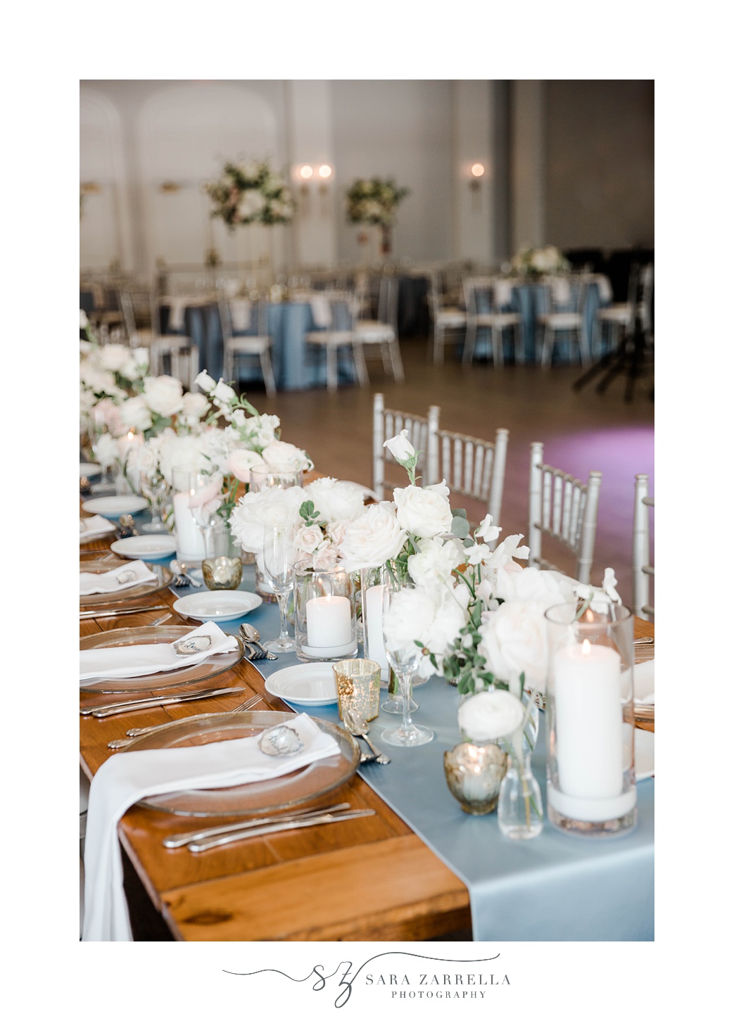 place settings with blue table runner for elegant reception at Gurney's Resort