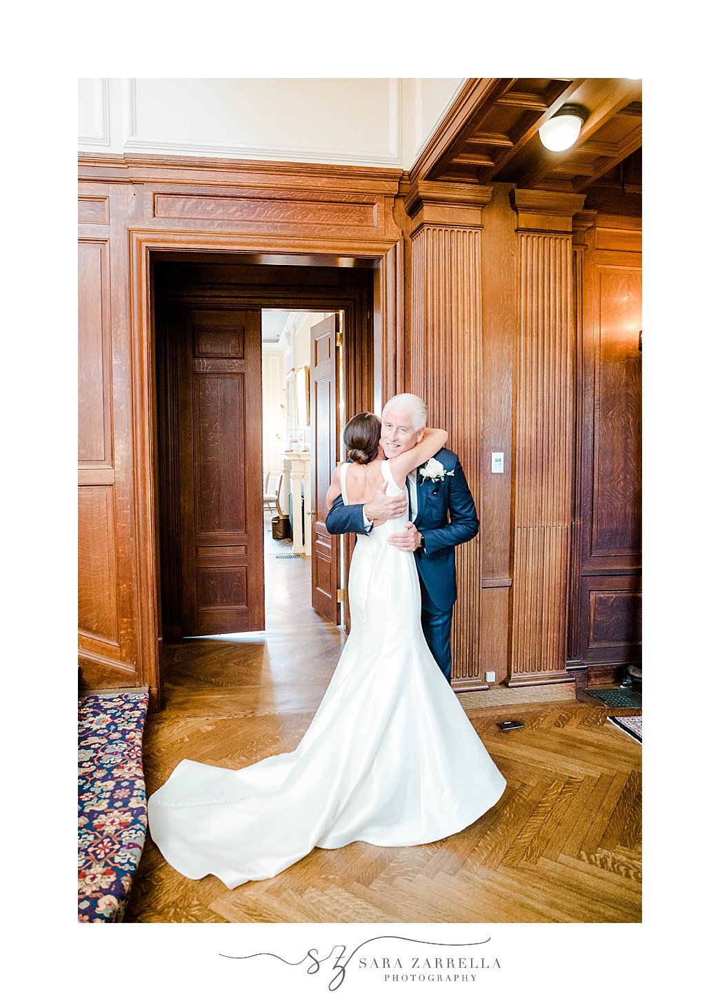 bride and groom hug during first look at New York Yacht Club