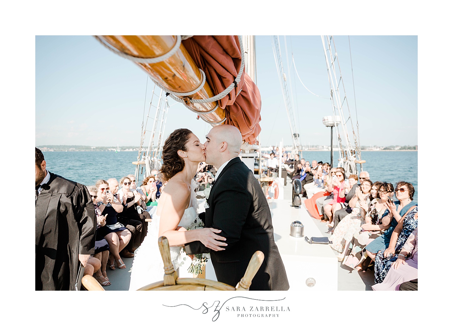 newlyweds exchange vows during schooner Aurora ceremony