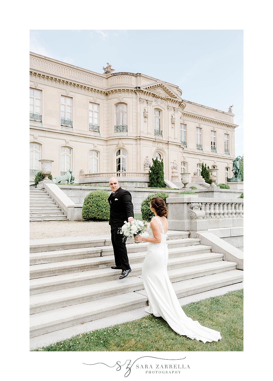 newlyweds walk up steps at The Elms
