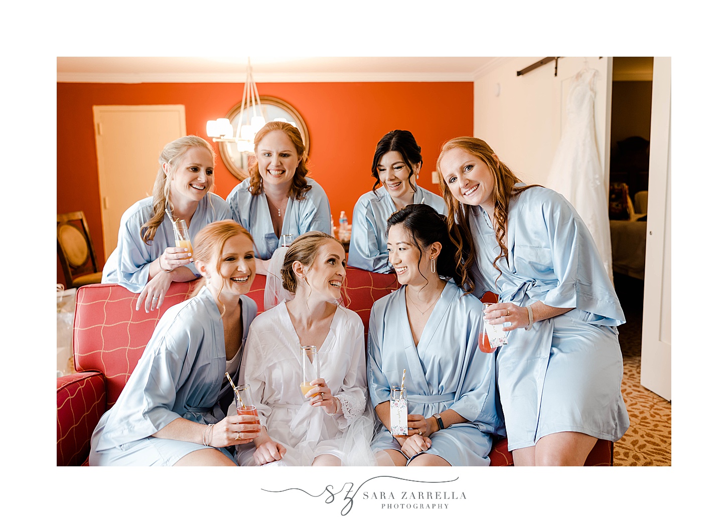bridesmaids laugh with bride before RI wedding day