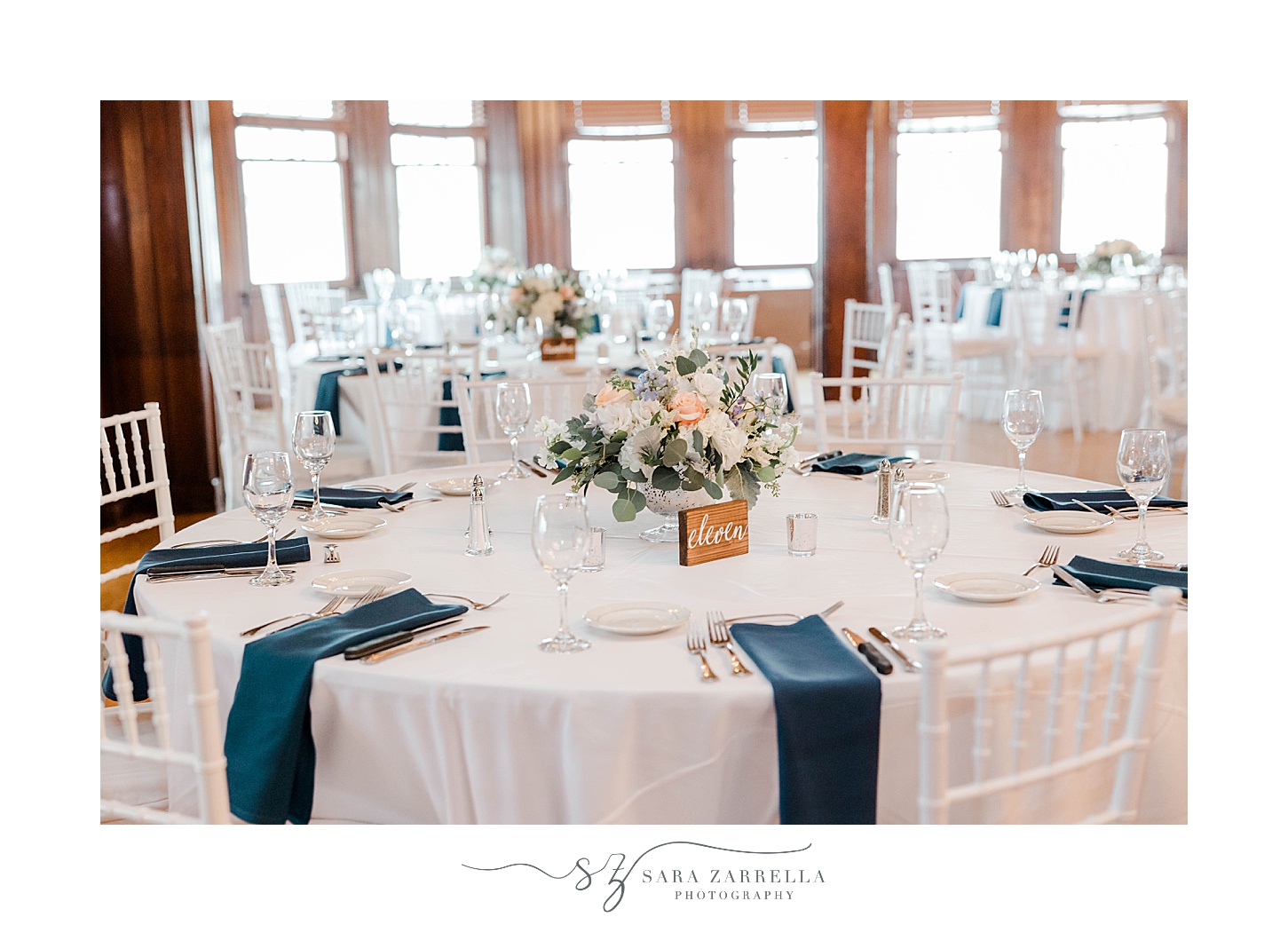 rustic wedding reception at Squantum Association with blue and white details 