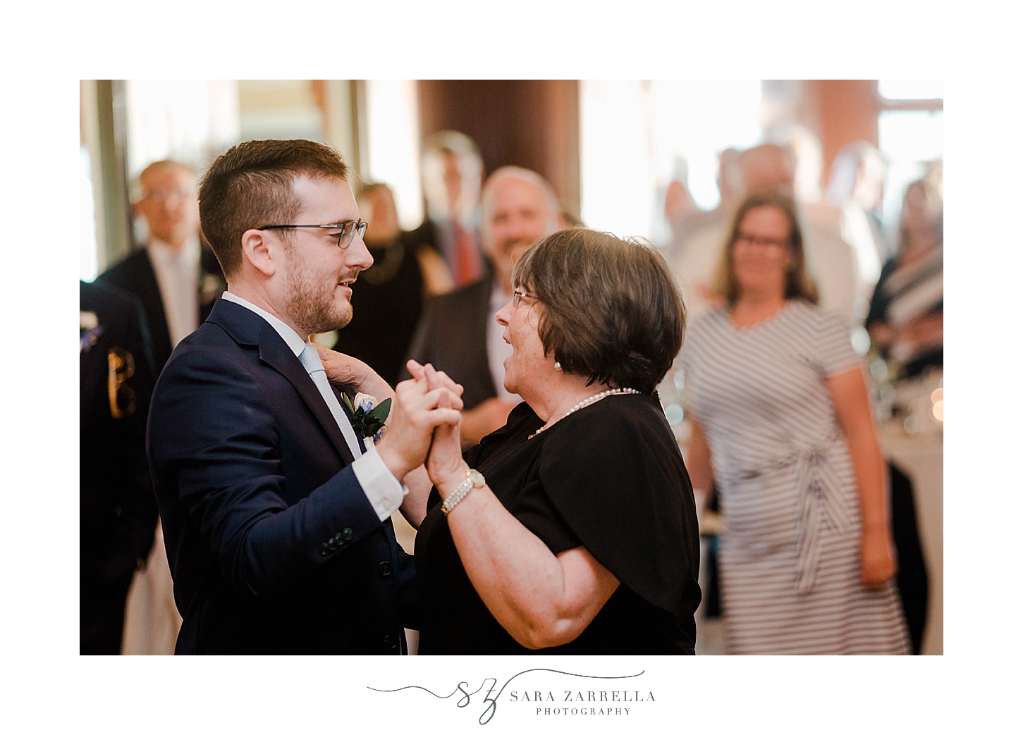 groom and mom dance together during RI wedding reception