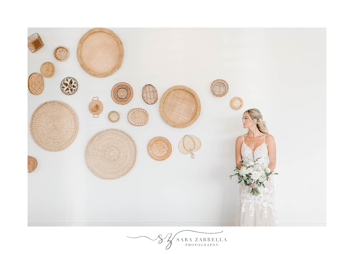 bride poses under woven basket display at Newport Beach House