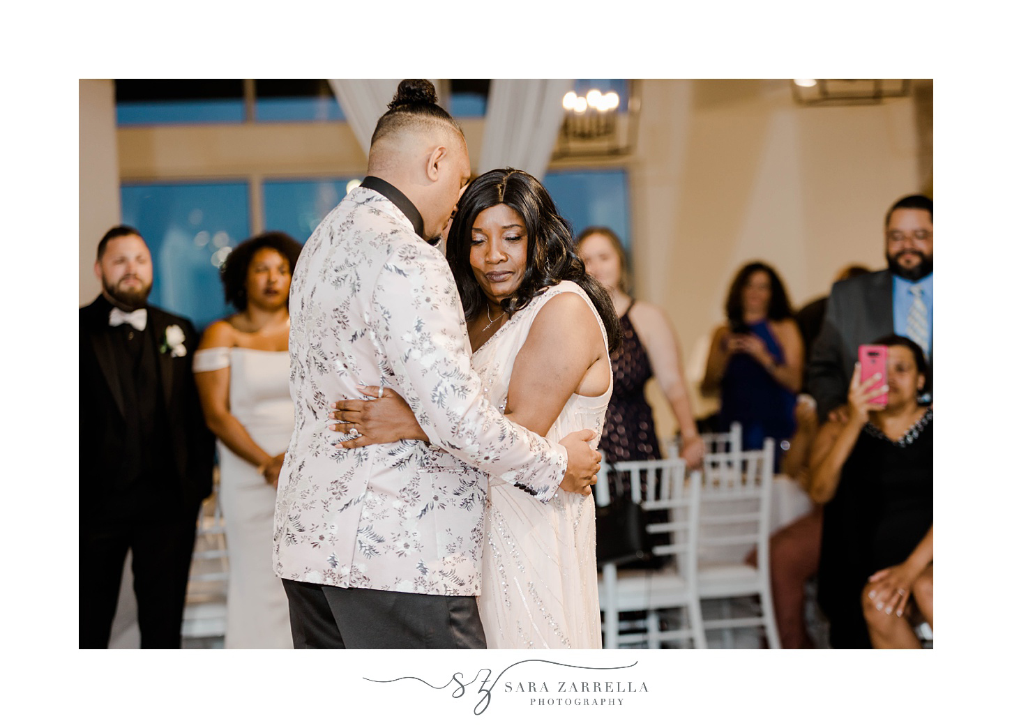 groom and mom hug during dance during Newport RI wedding reception