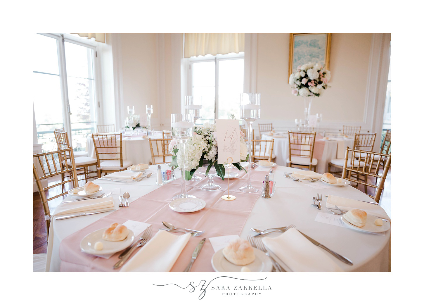place settings with pastel pink table cloth
