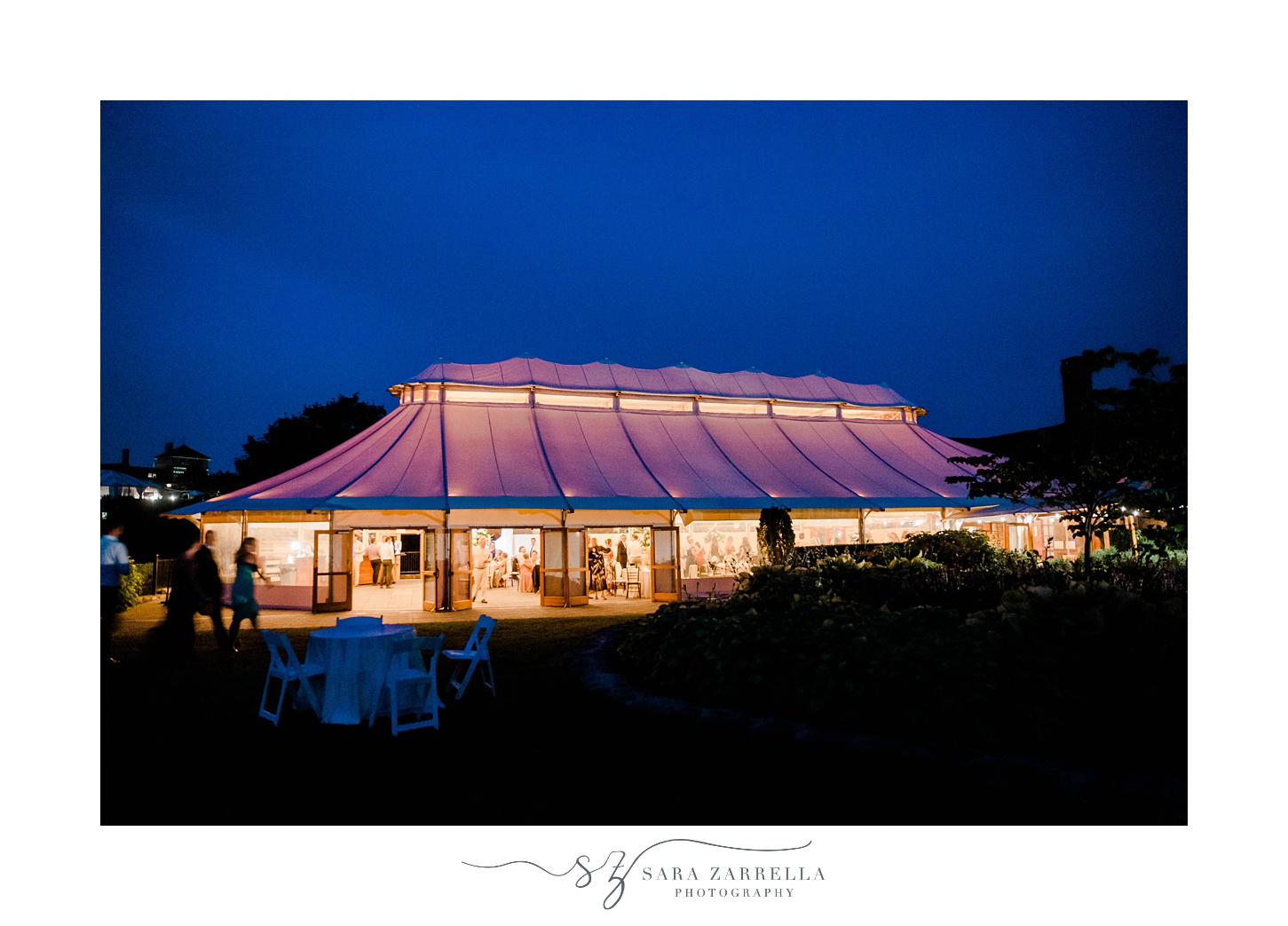 tented wedding reception at Castle Hill Inn at dusk