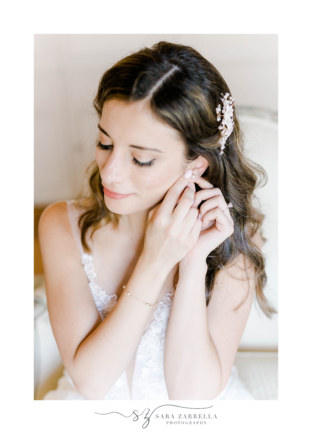 bride adjusts earrings before Glen Manor House wedding