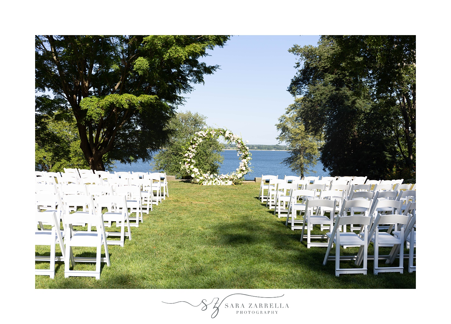 ceremony site at Glen Manor House with white floral arch