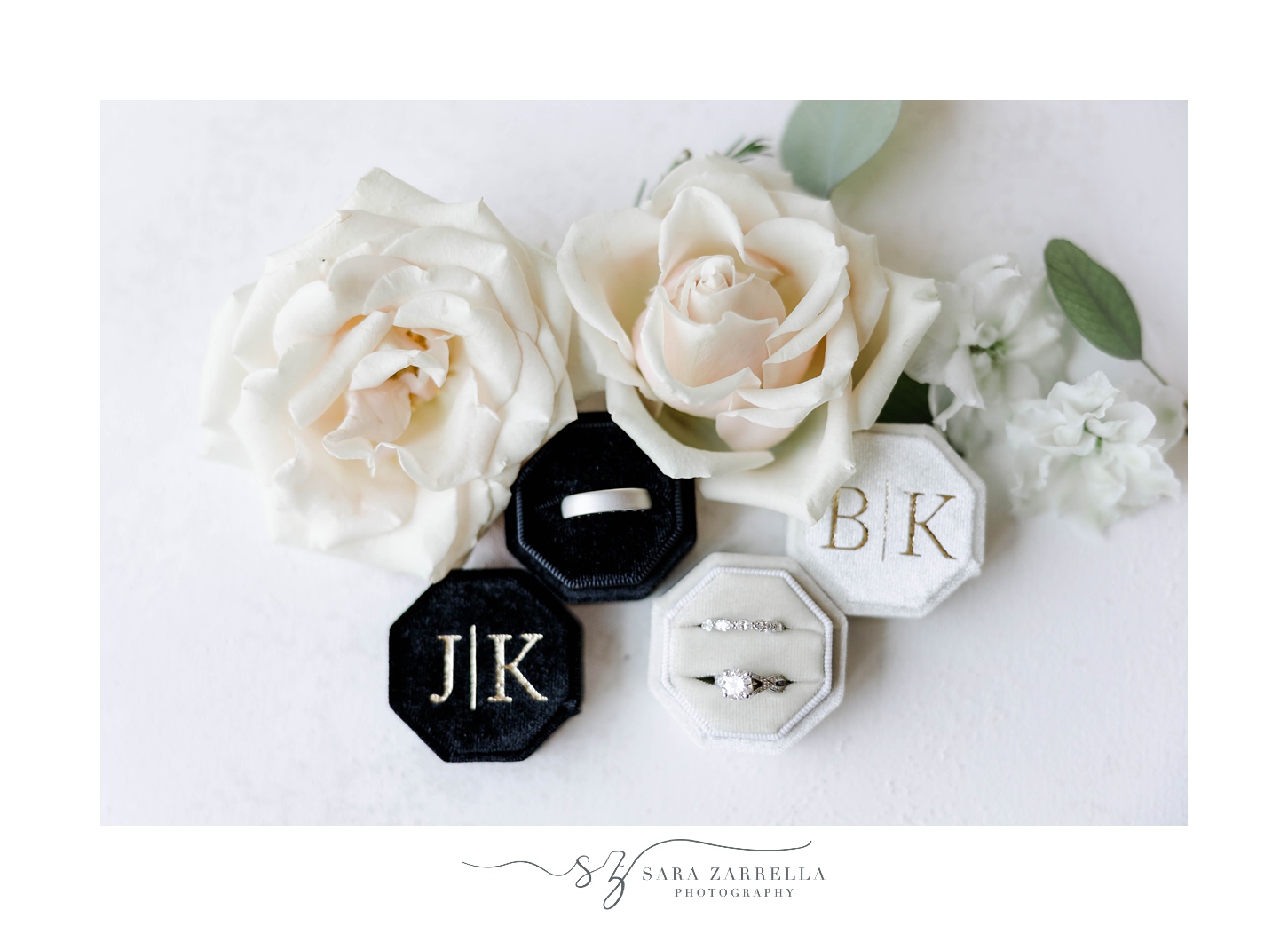 bride and groom's rings in custom ring boxes 