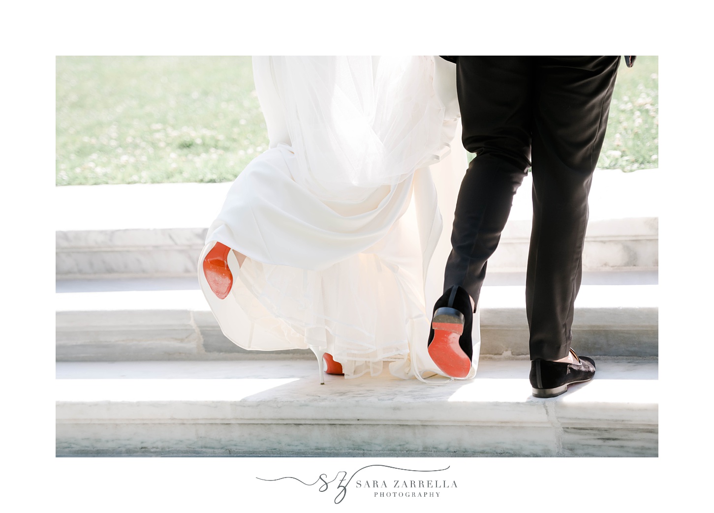 bride and groom walk up steps showing off Louboutin shoes