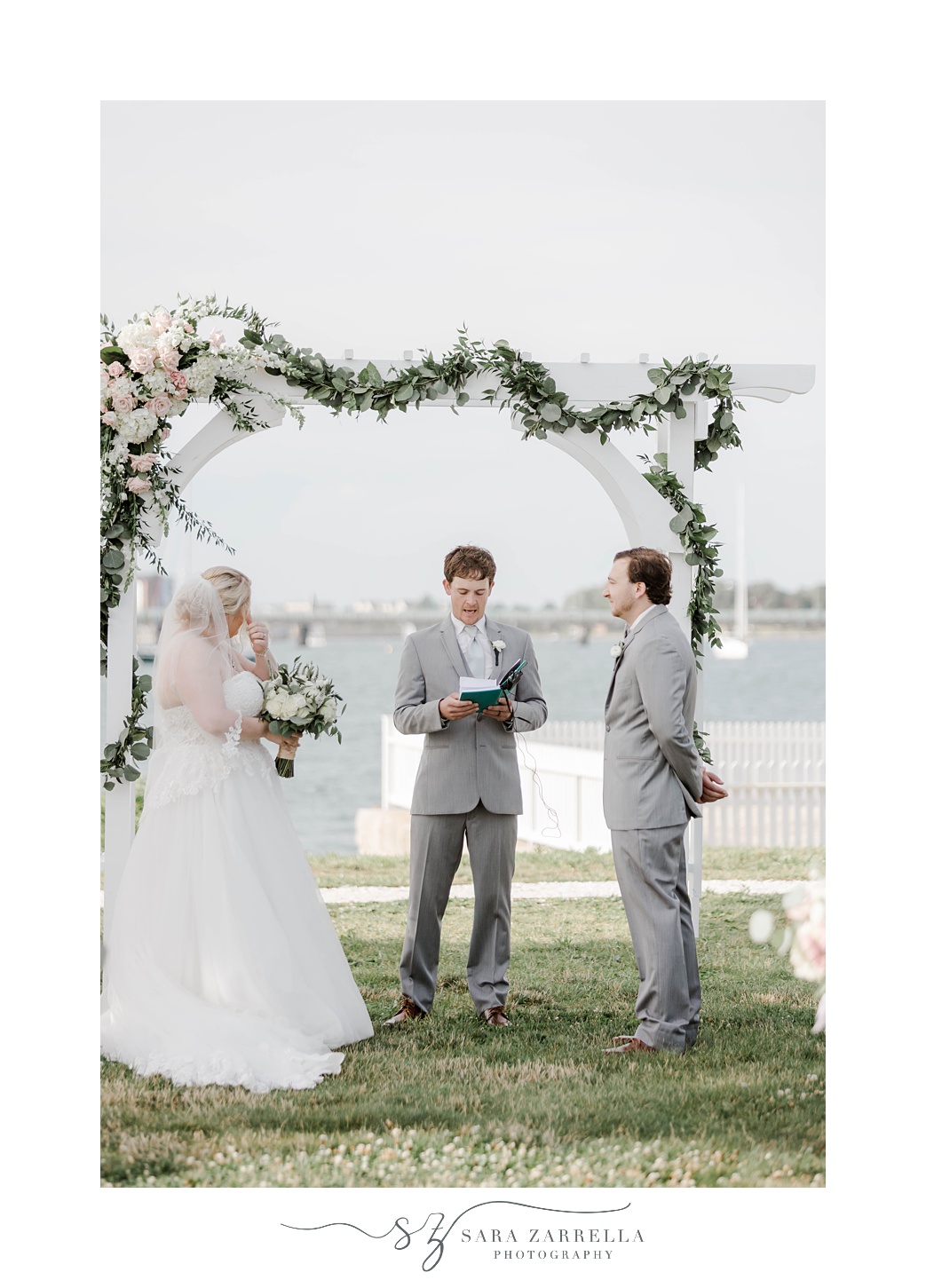 bride and groom exchange vows during Gurney’s Newport wedding ceremony 