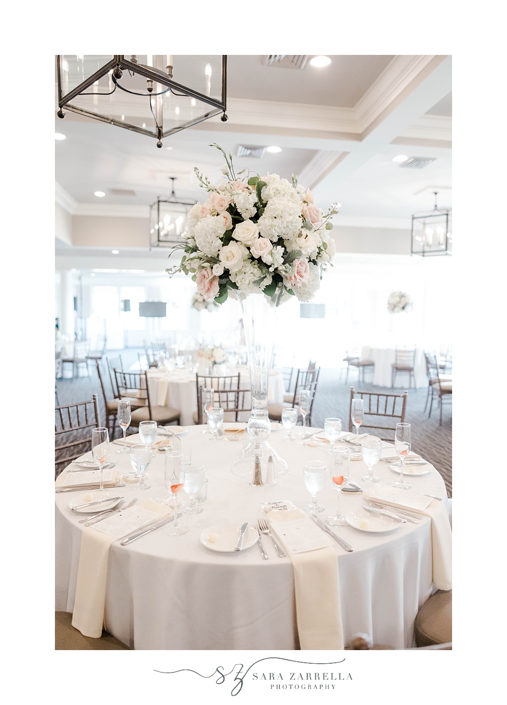 tall floral centerpieces at Harbor Lights wedding reception 