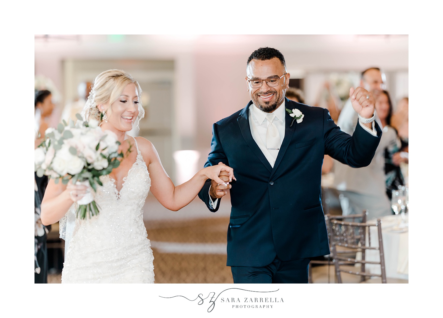 bride and groom dance into wedding reception in Rhode Island 