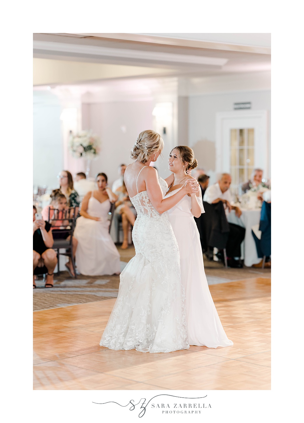 bride and daughter dance during RI wedding day