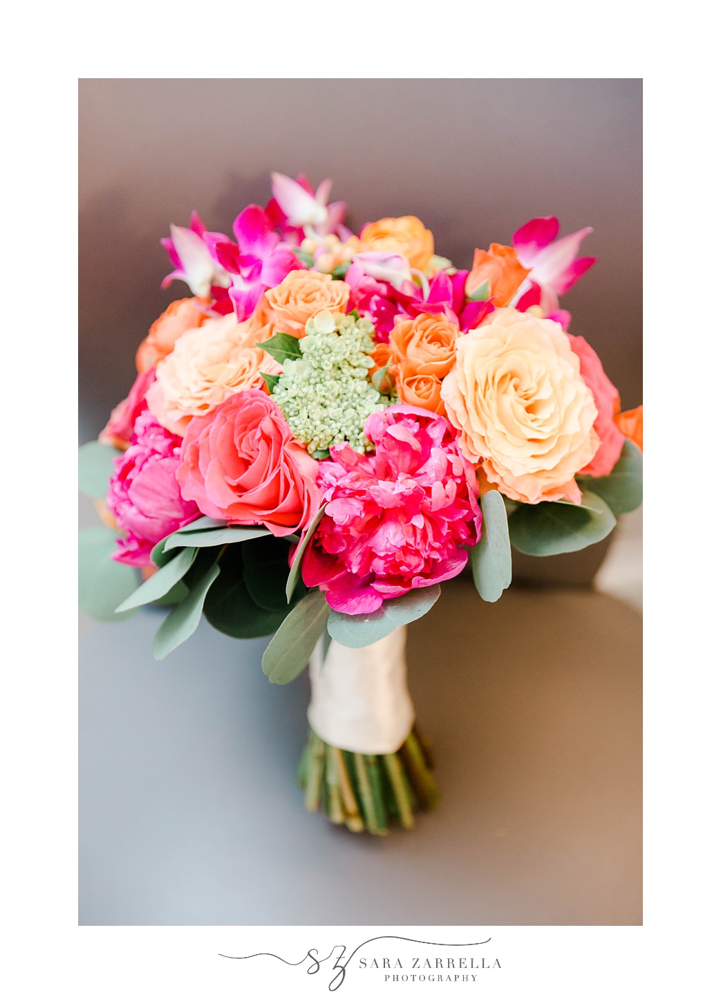 bright wedding bouquet with pink and orange flowers