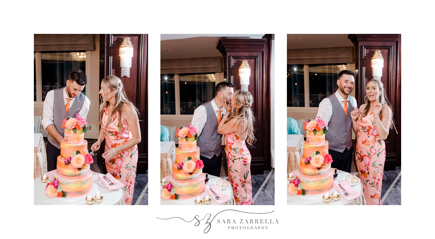 couple kisses during cake cutting in tropical inspired outfits 