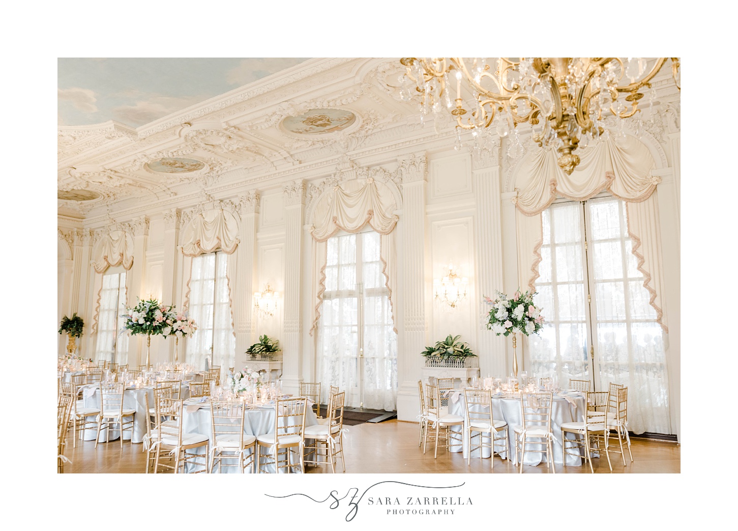 Rosecliff Mansion wedding reception with tall centerpieces 