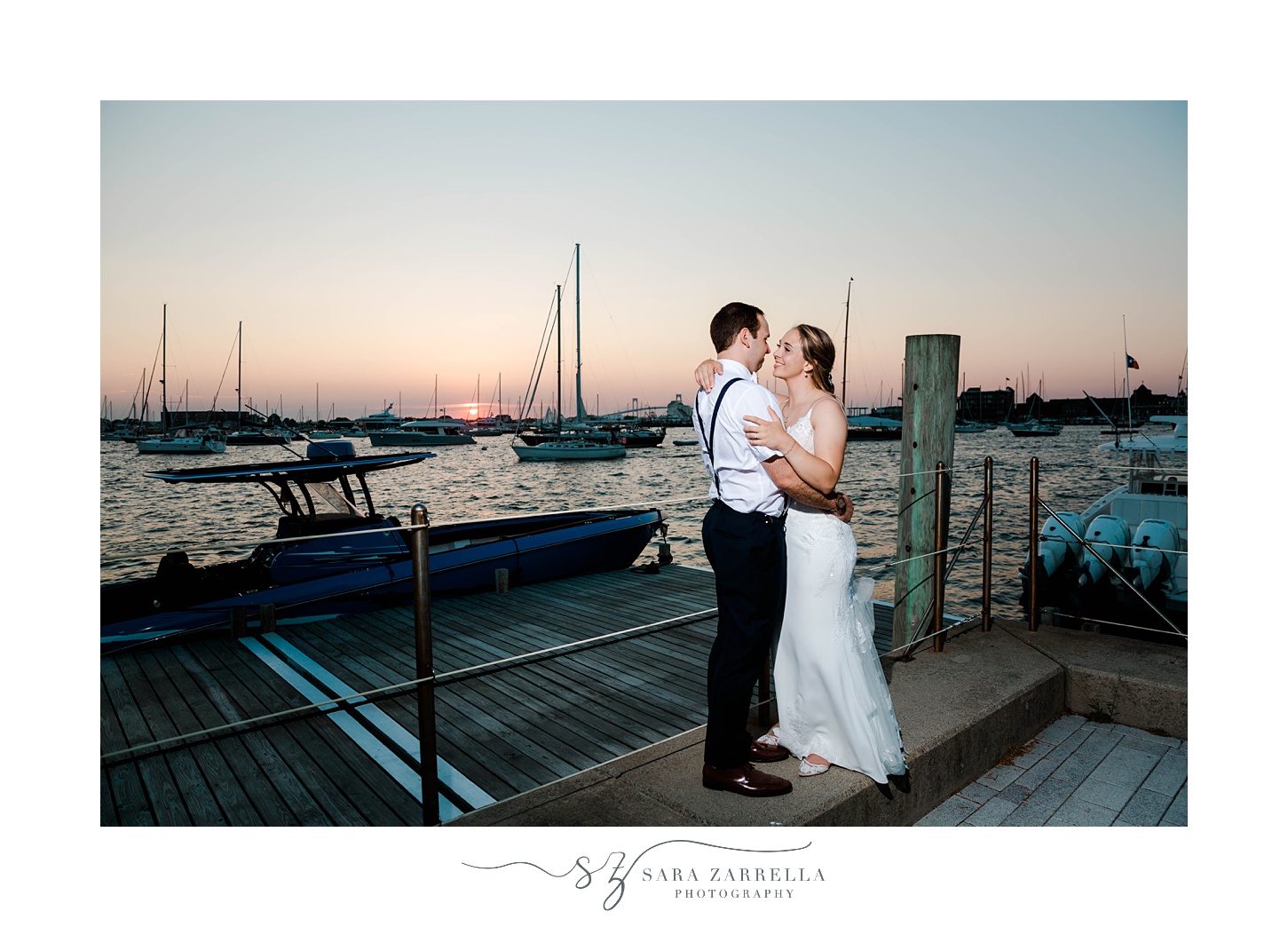 sunset portraits along marina at The Bohlin of bride and groom
