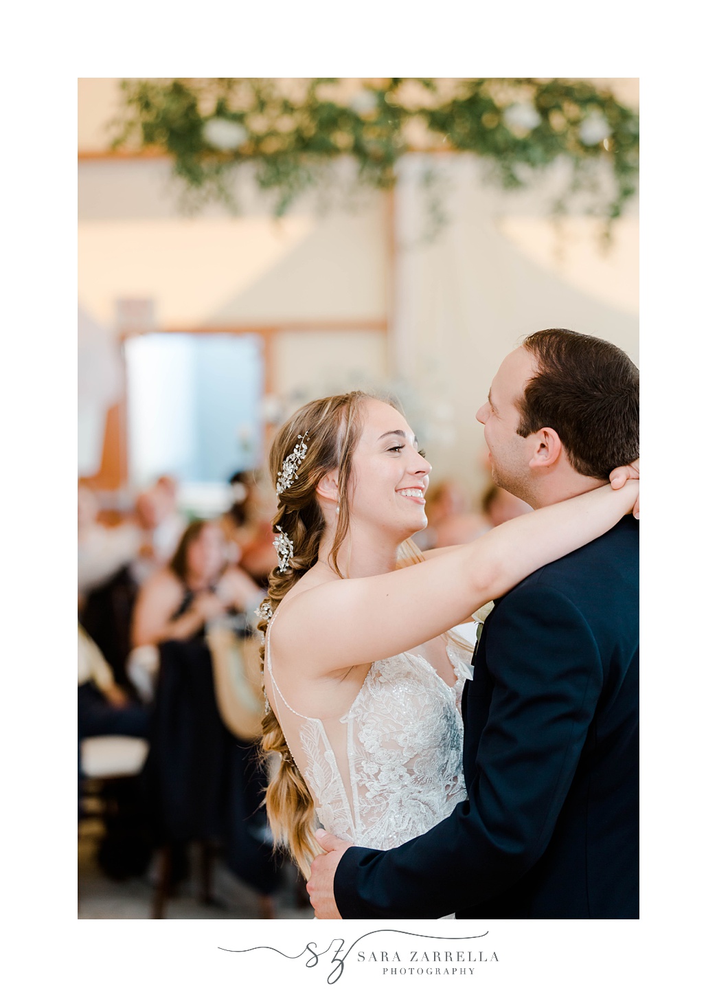 bride smiles at groom during first dance at The Bohlin wedding reception