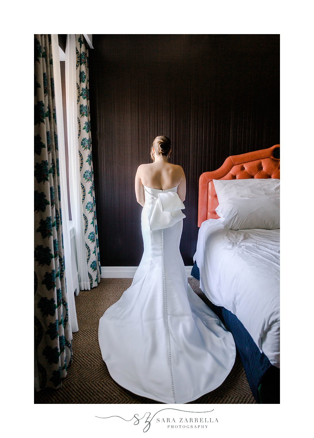 back of wedding gown with bow