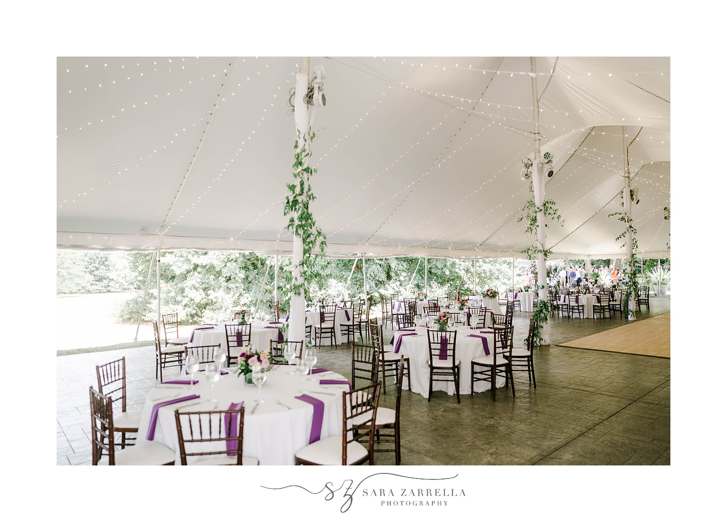 tented wedding reception with purple and green details 