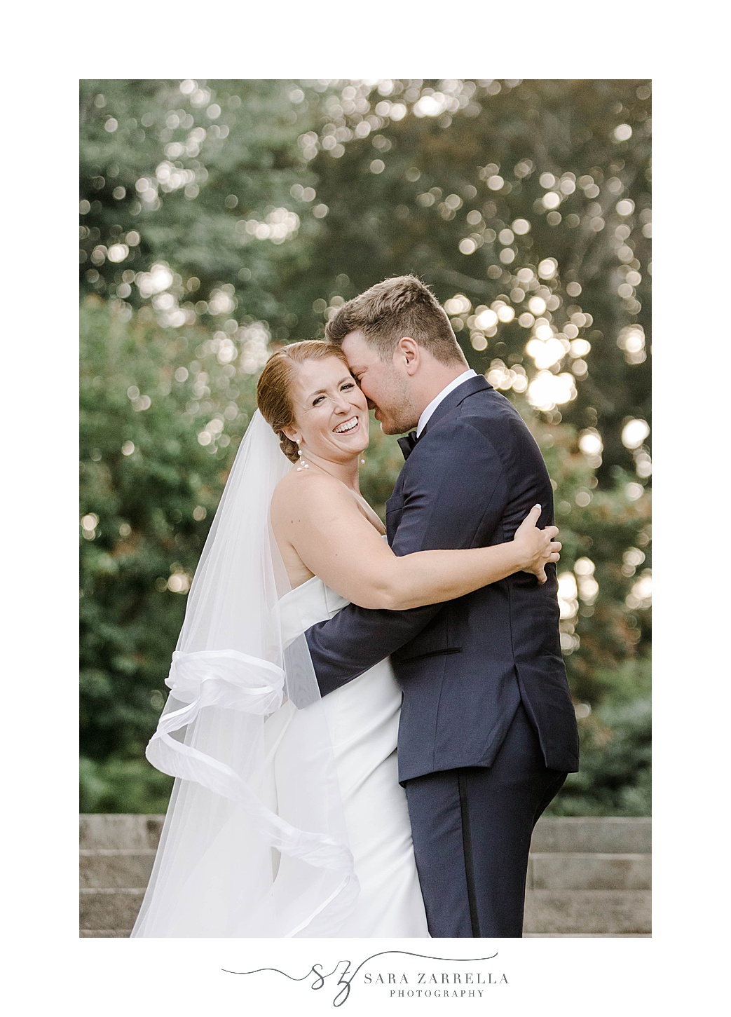 bride and groom hug during wedding photos at Glen Manor House