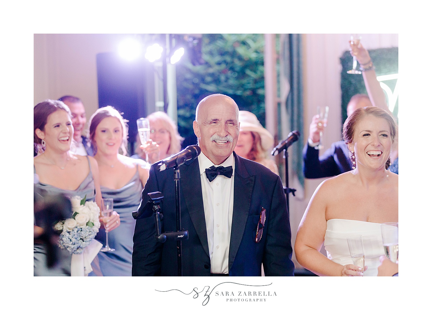 dad smiles during speech next to bride