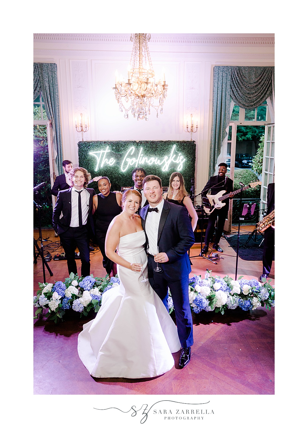 bride and groom stand in front of live band at Glen Manor House