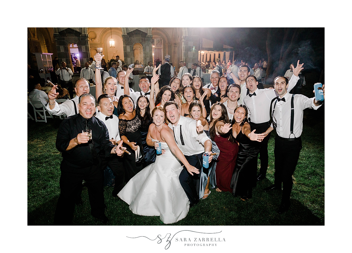 bride and groom pose with guests at Glen Manor House