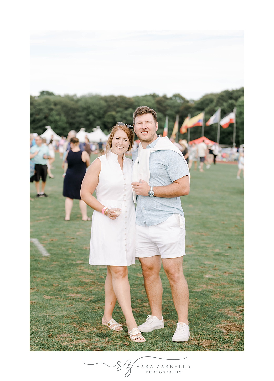 bride and groom pose at Newport Polo match