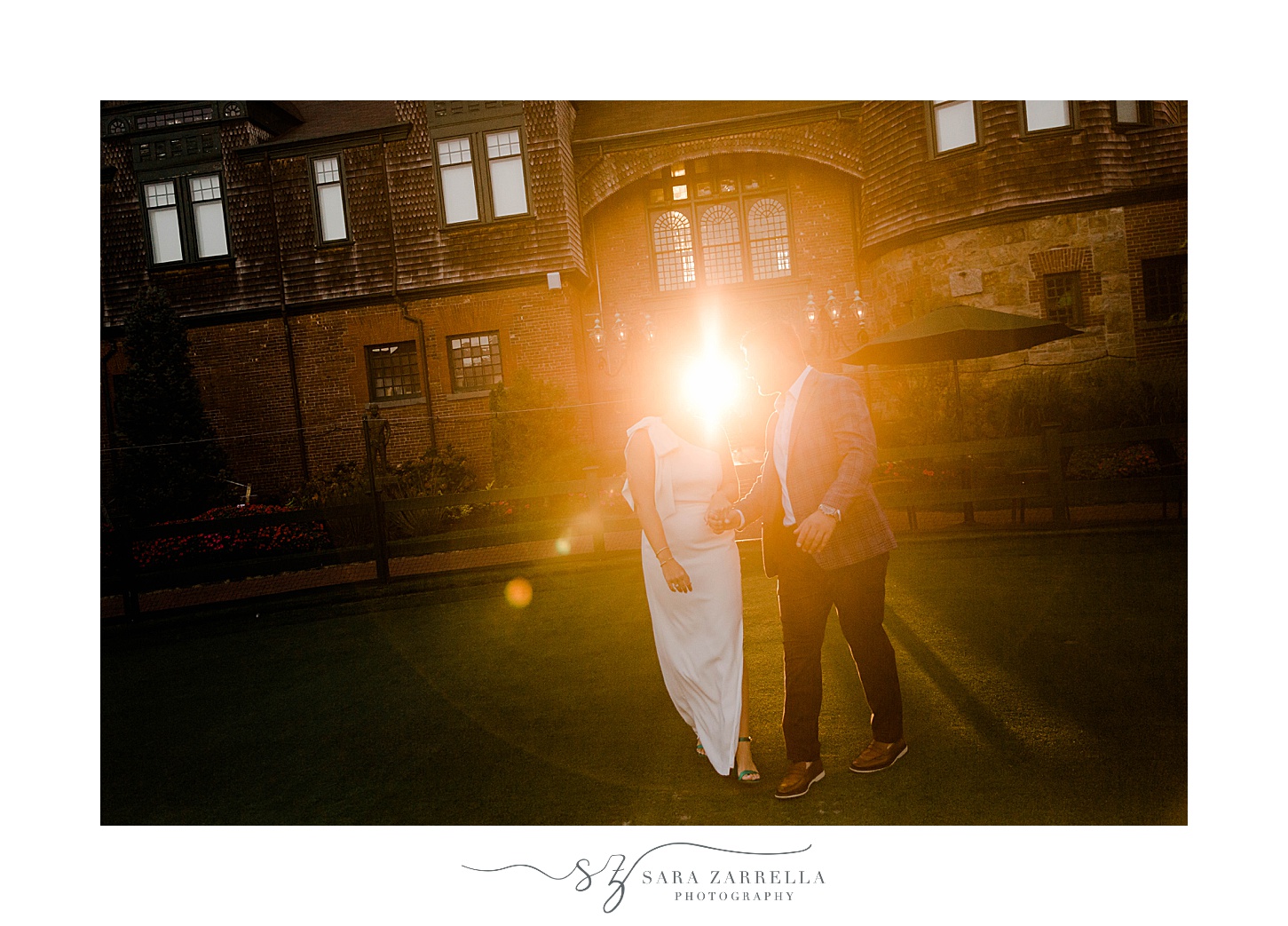 sunset portraits at The International Tennis Hall of Fame of bride and groom