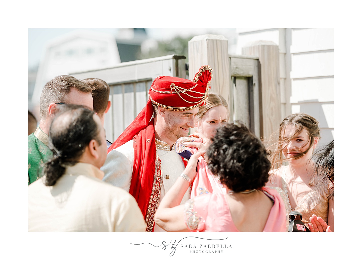 groom walks through guests for traditional Indian wedding ceremony at Newport Beach House