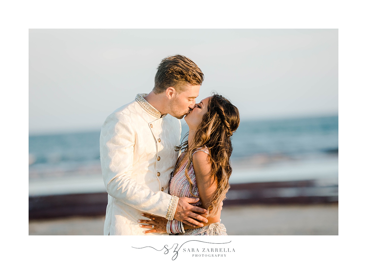 bride and groom kiss on Newport Beach