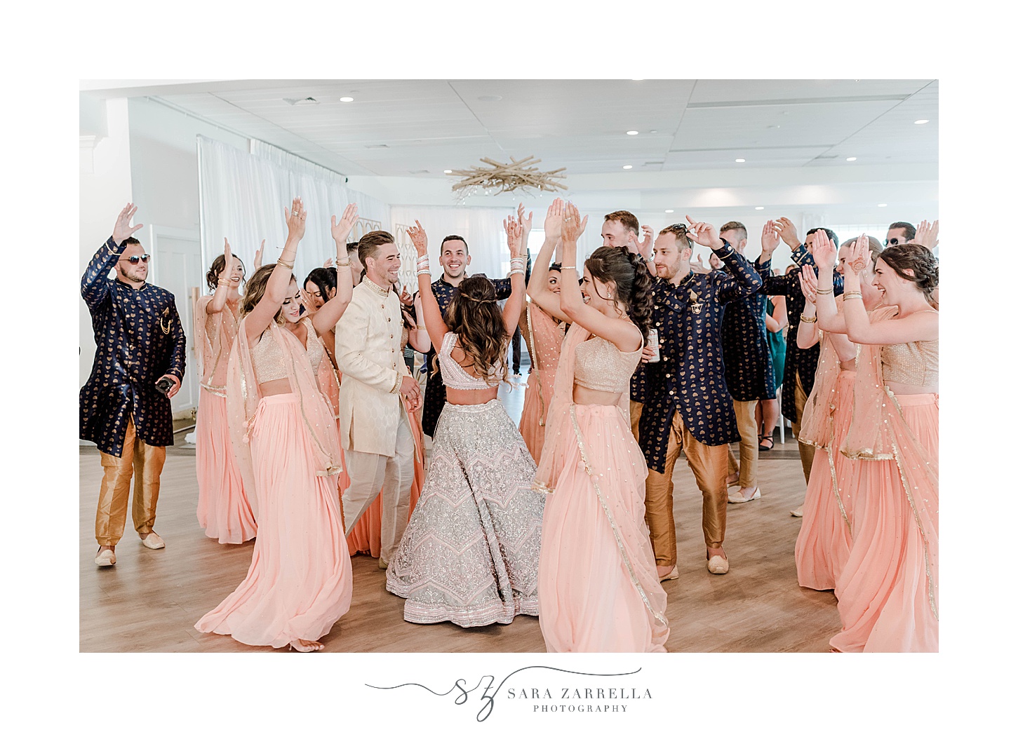 bride and groom dance with wedding party at Newport Beach House