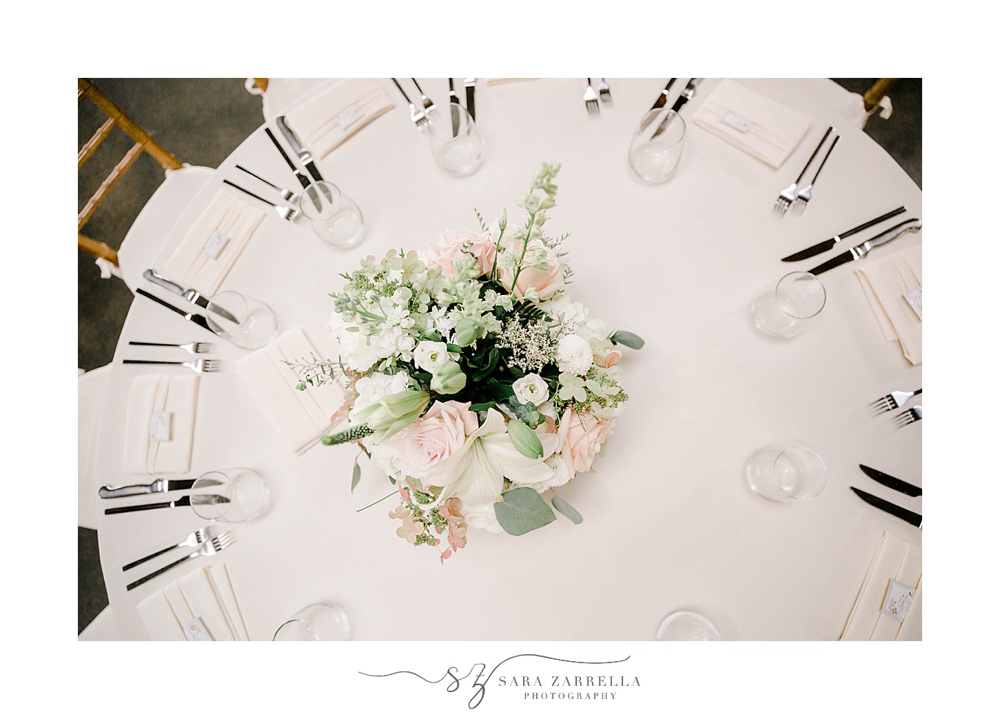 pink and white flowers on table for Newport Vineyards wedding reception