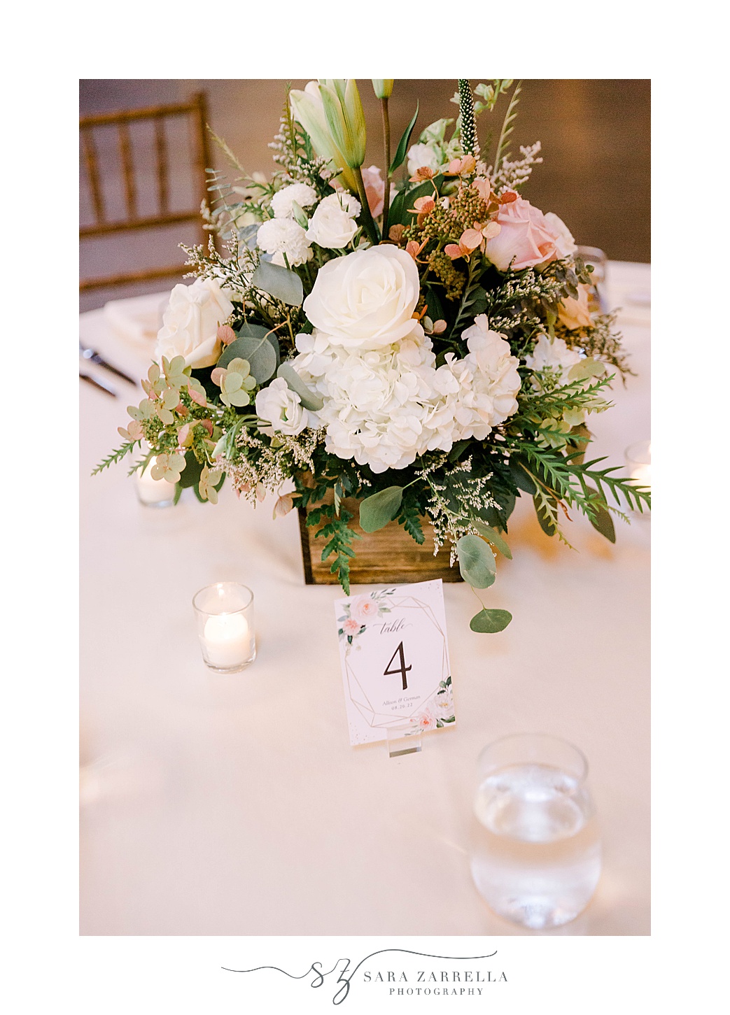 white and pink floral centerpieces at Newport Vineyards