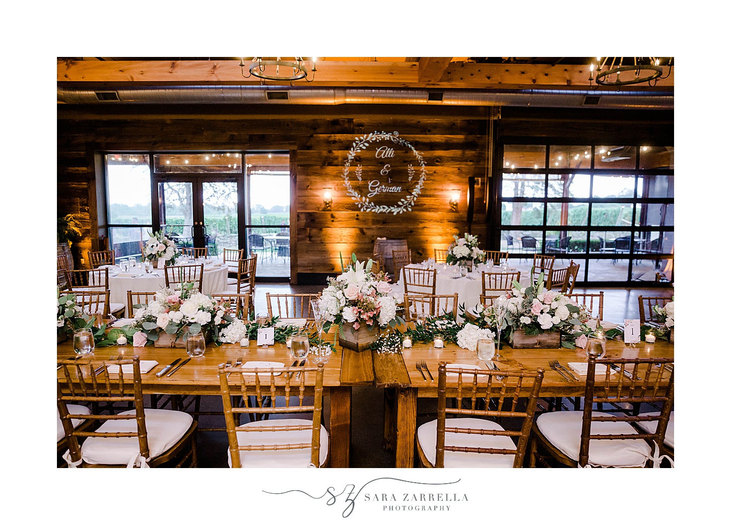 family style seating for reception in barn at Newport Vineyards