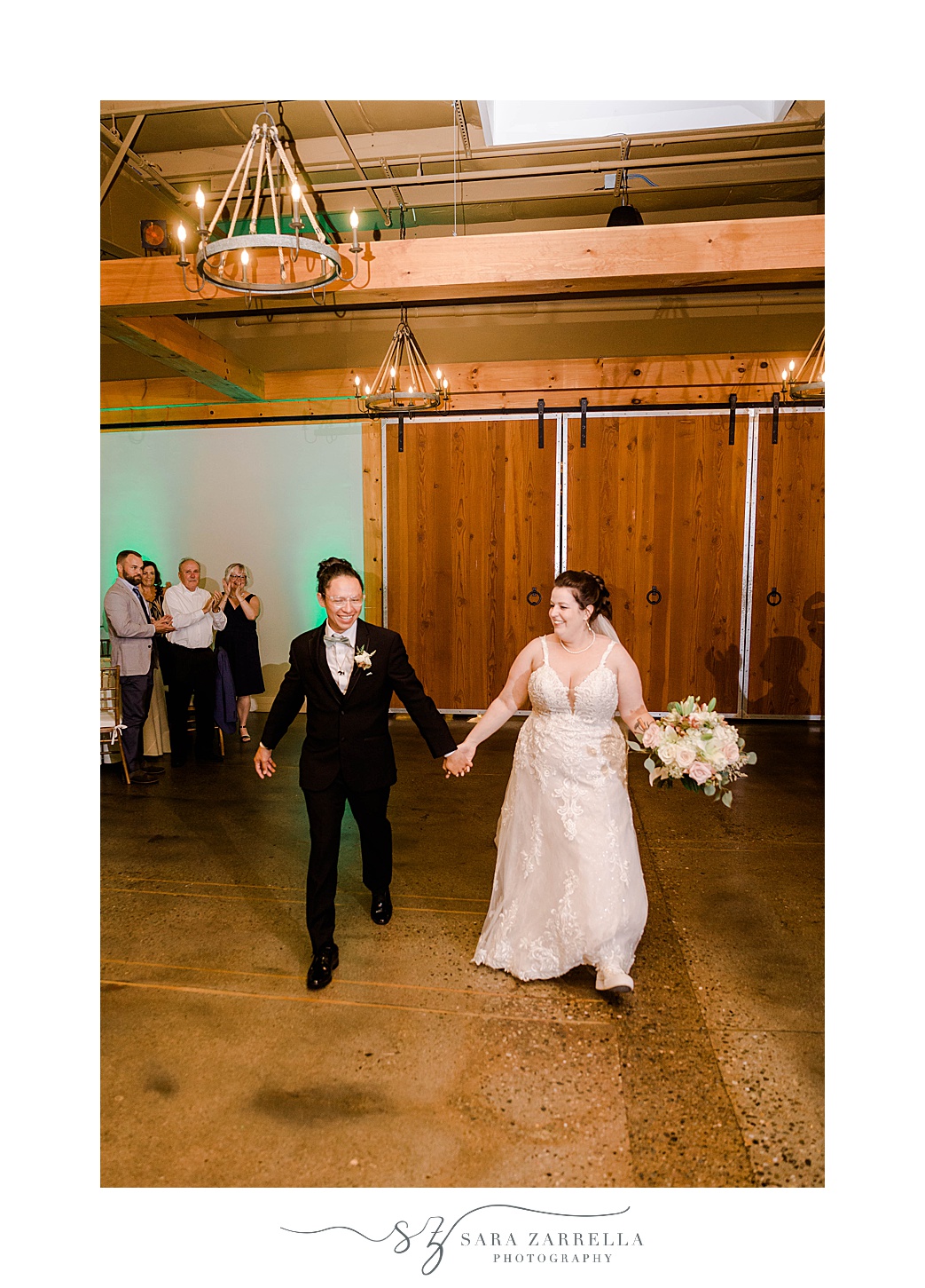 newlyweds walk onto dance floor in Newport RI