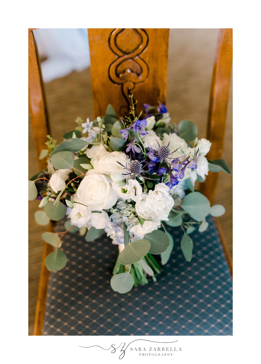 bride's white and purple bouquet for Regatta Place wedding