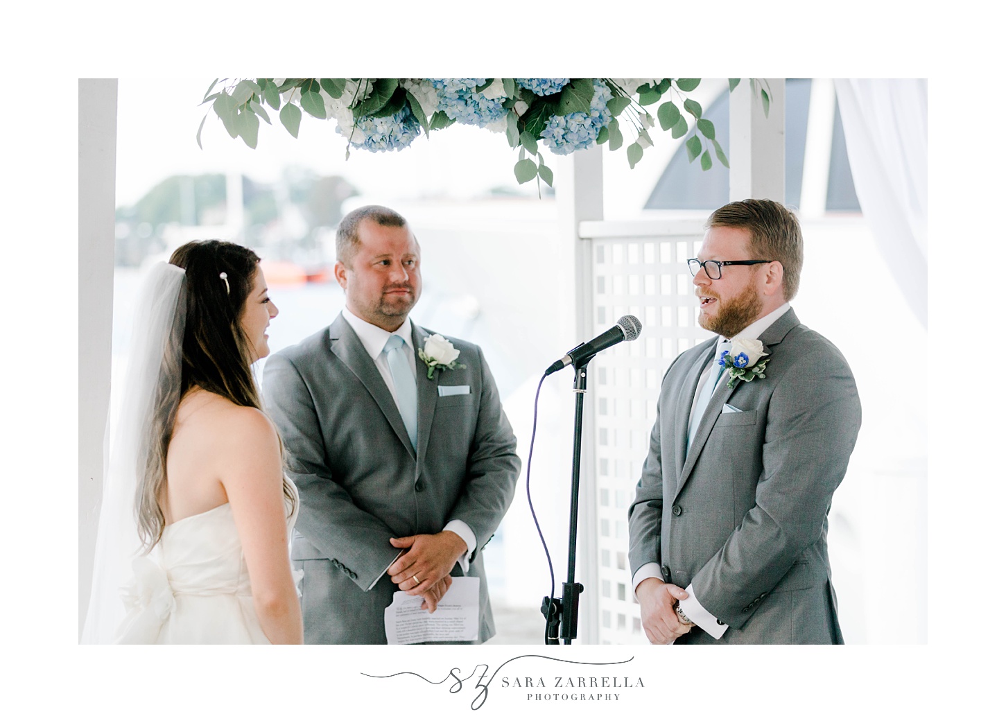 groom reads vows during Regatta Place wedding ceremony